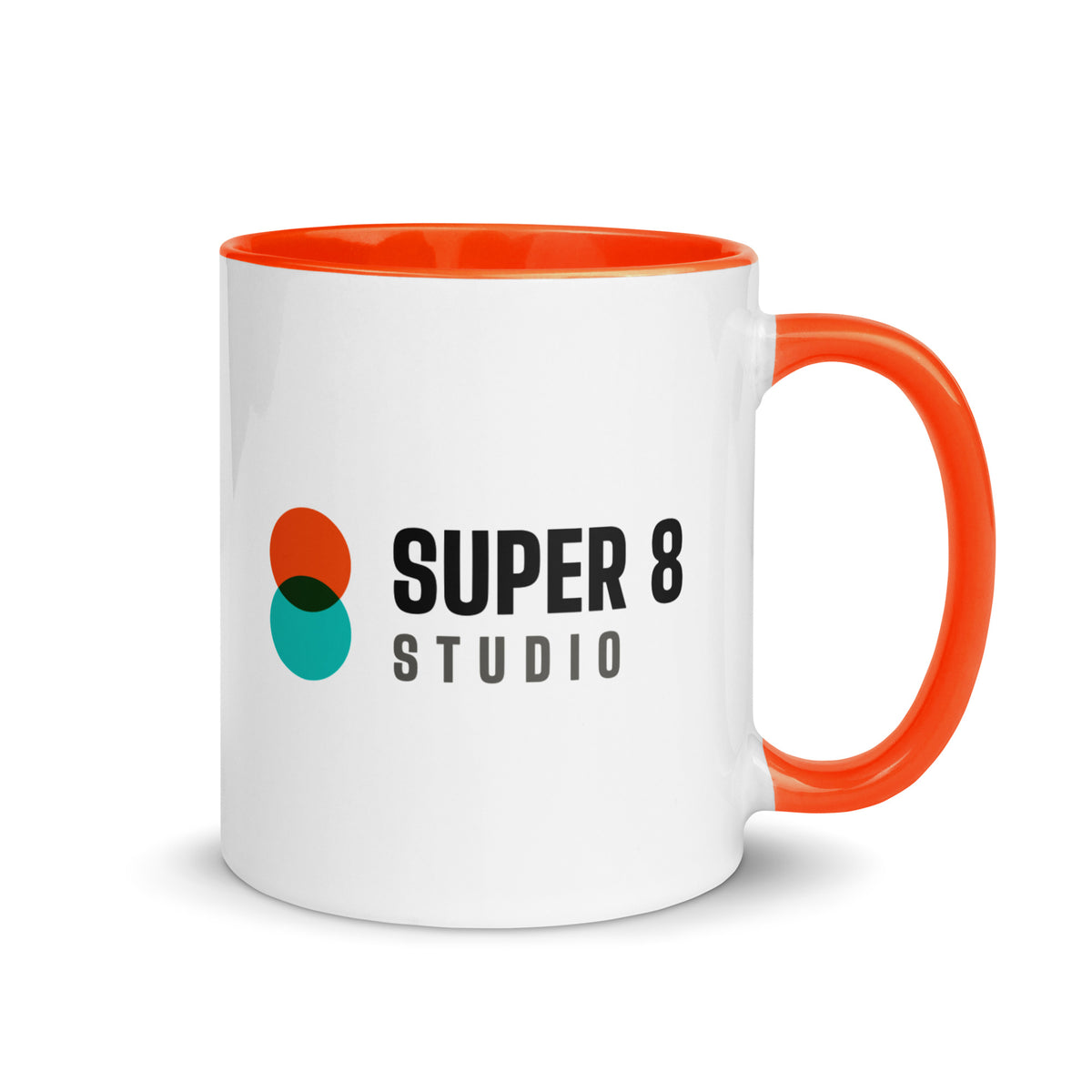 Super 8 Studio mug from the other side, with its orange handle and inside