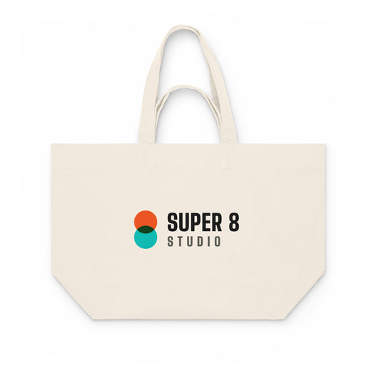 Super 8 Studio shopping bag in natural canvas, front, with the full-colour Super 8 Studio logo